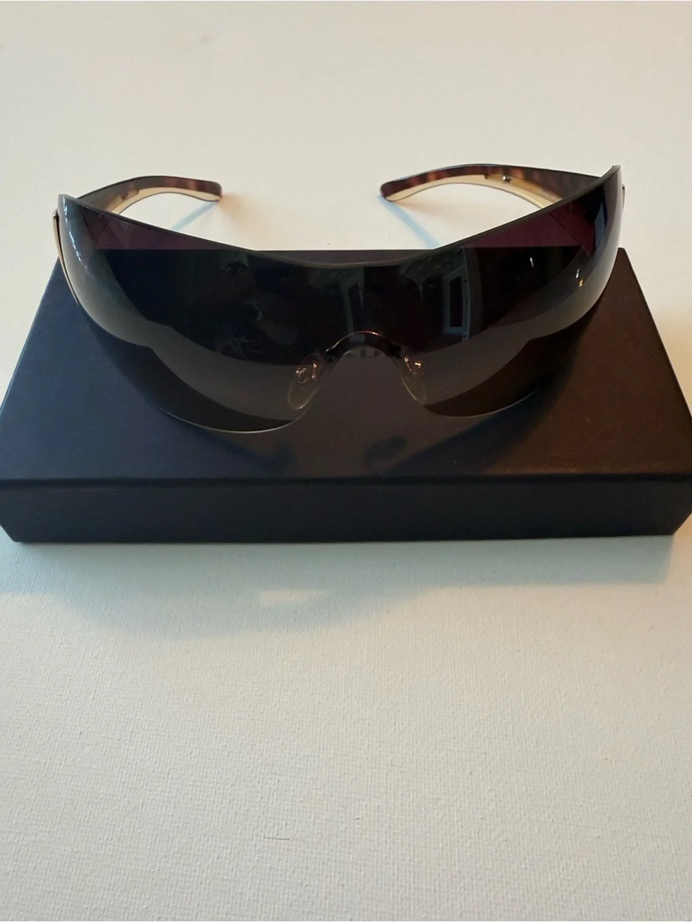 Prada Brown Gradient Rimless Sunglasses with Gold Accents